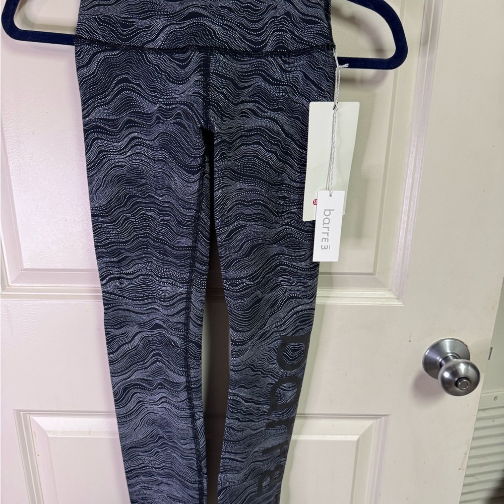 Lululemon In Movement 25" tights in the Aerial Dot Starlight Black color
